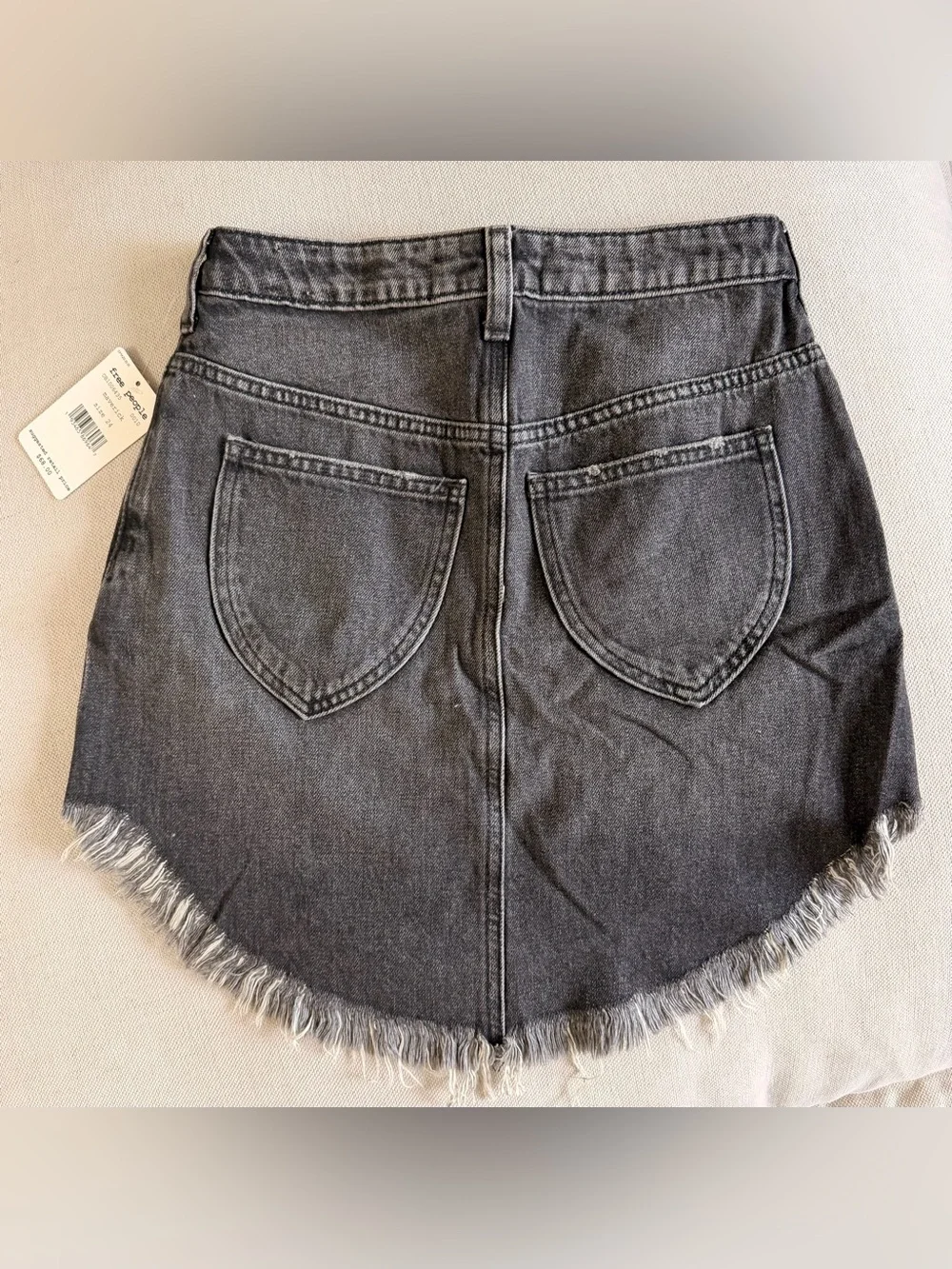 Free people Denim Fringe Hem Mini Skirt in color Maverick size 24 NWT